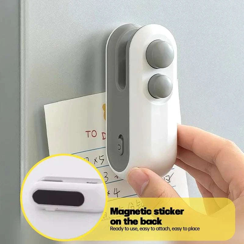 portable bag sealer with battery compartment open
